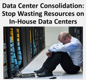 Frustrated man sitting on floor in data center